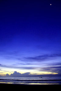 Scenic view of sea against sky at sunset