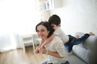 Mom and son together, gentle hugs and relationships. lifestyle and light background, photos