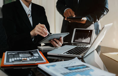 People using laptop on table