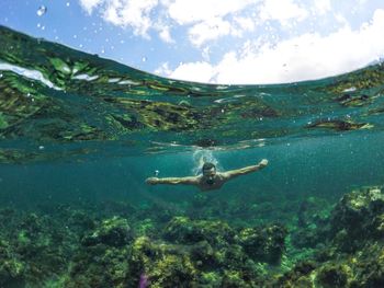 Woman swimming in sea