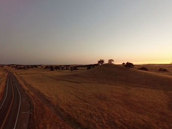 Panoramic view of desert against clear sky