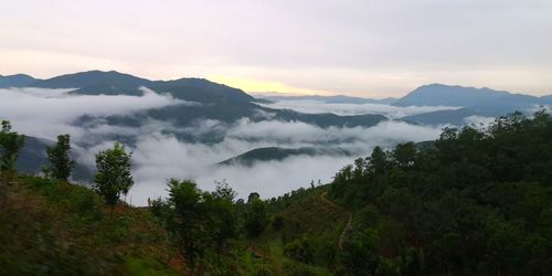 Scenic view of mountains against sky during sunset