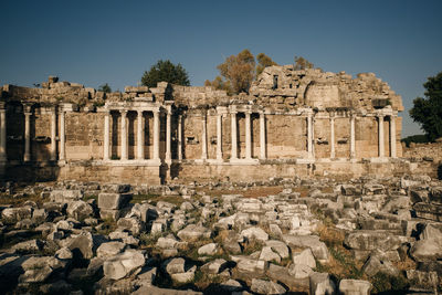 Old ruins of temple against clear sky