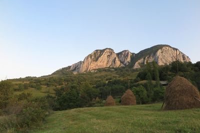 Scenic view of rocky mountains against clear sky