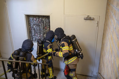 Firefighters on staircase