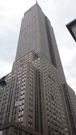 Low angle view of modern building against sky