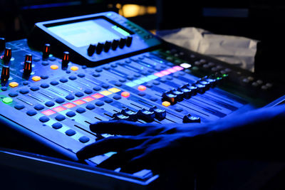 Closeup of an audio mixing control panel