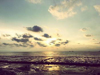 Scenic view of sea against sky at sunset