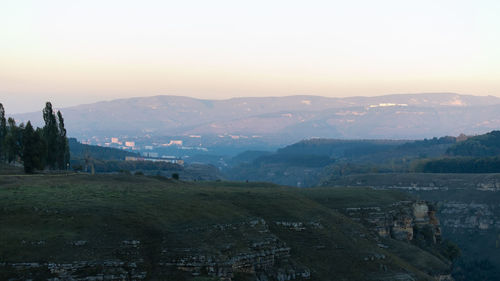 Scenic view of landscape against sky during sunset