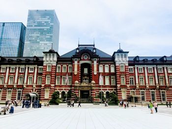 Group of people in front of tokyo station building