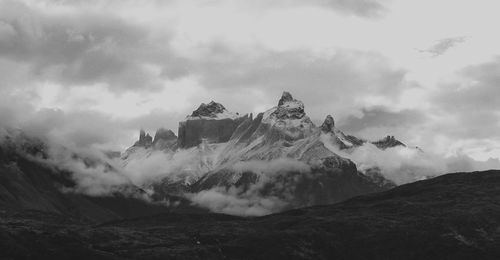 Panoramic view of mountain range against sky