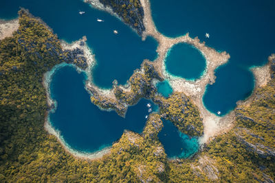 A drone view of a beautiful rock formation of the twin lagoon in coron palawan