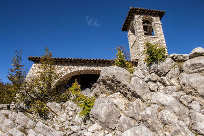 Low angle view of historical building against clear sky