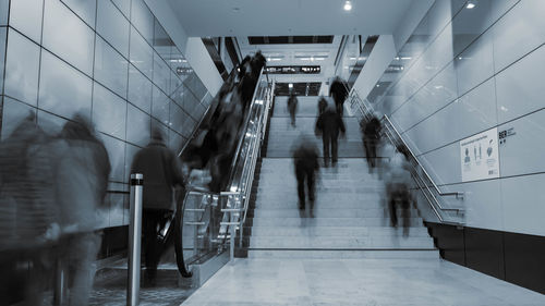 People walking in modern building