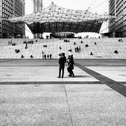 Woman standing in city