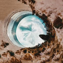 Digital composite image of beach against sky