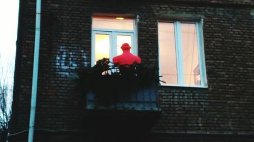 Man sitting by window