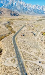 High angle view of winding road on landscape