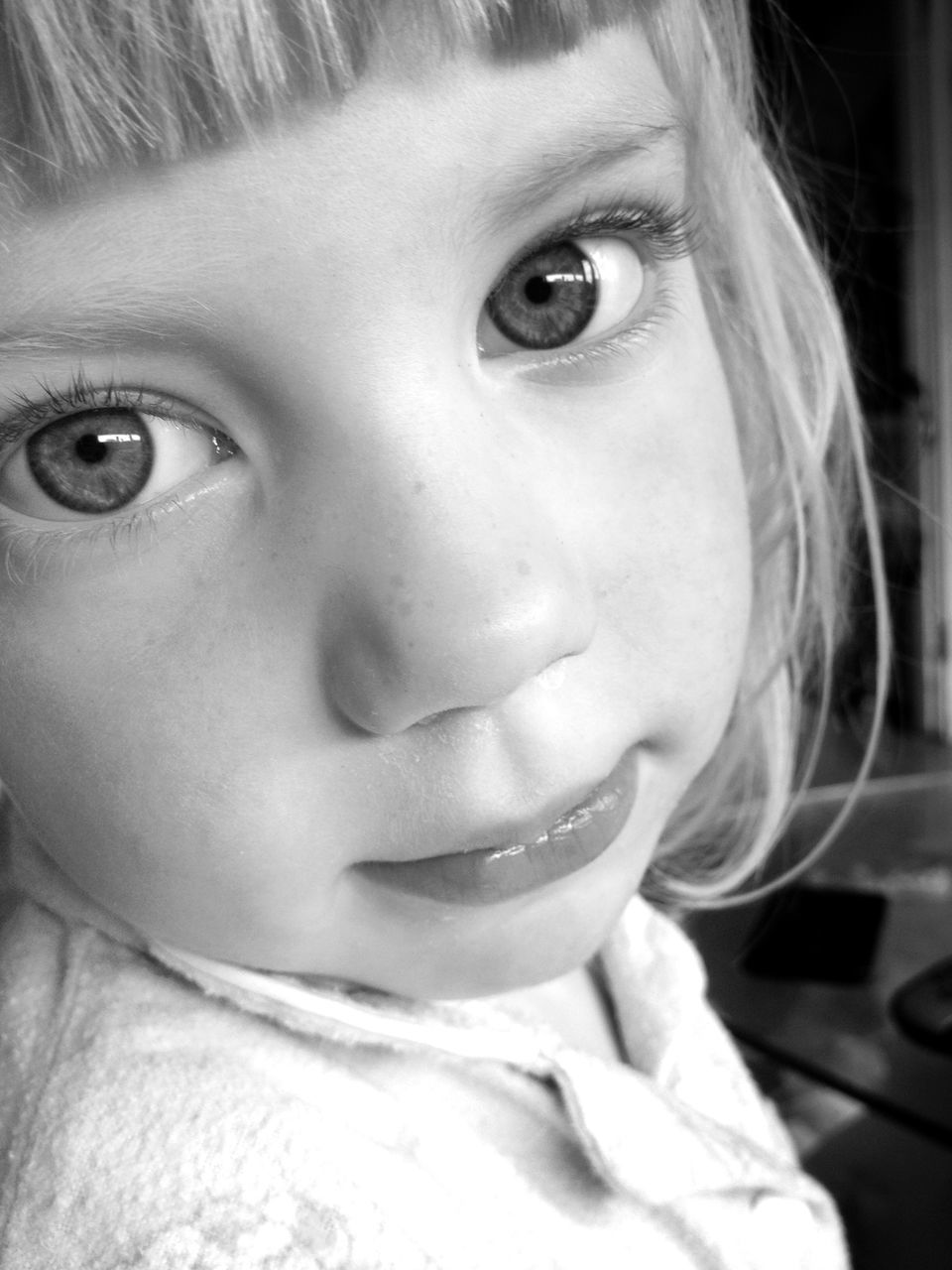 person, looking at camera, headshot, close-up, portrait, human face, indoors, young adult, lifestyles, front view, young women, leisure activity, childhood, focus on foreground, head and shoulders, smiling