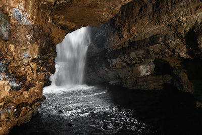 Waterfall at smoo cave in scotland