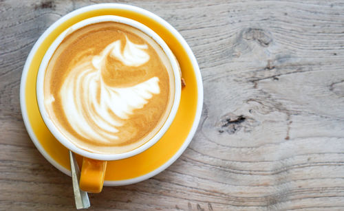 Directly above shot of cappuccino on table