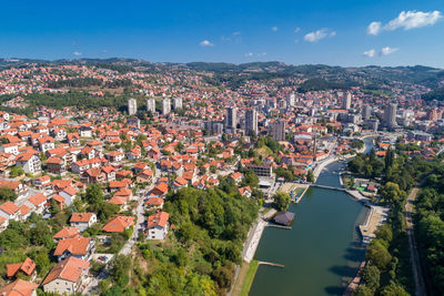 High angle view of townscape against sky in city