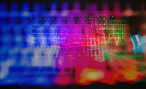 Digital composite image of illuminated lighting equipment at night