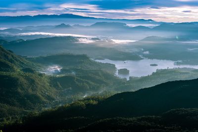 Aerial view of landscape and mountains against sky