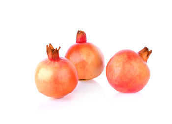 Close-up of apples against white background