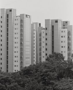 Low angle view of buildings against clear sky