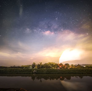 Scenic view of sea against sky at night