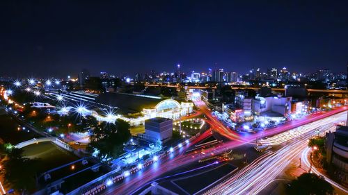 High angle view of illuminated city at night