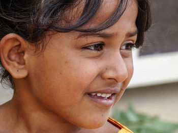 Close-up portrait of a smiling child