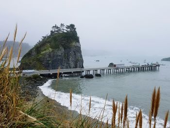 Scenic view of sea against sky during winter