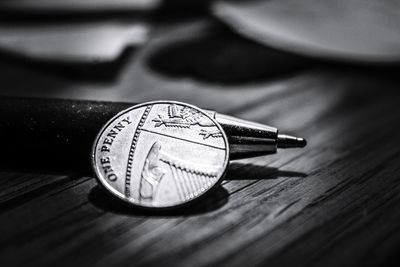 Close-up of clock on table