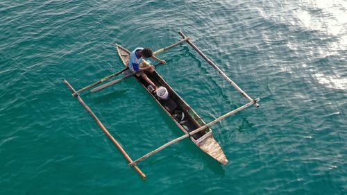 High angle view of woman on sea