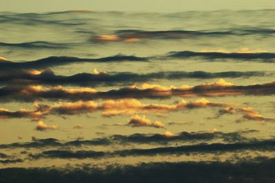 Scenic view of dramatic sky during sunset