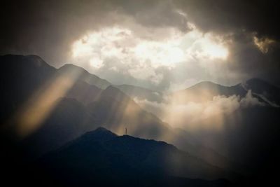 Scenic view of mountains against sky during sunset