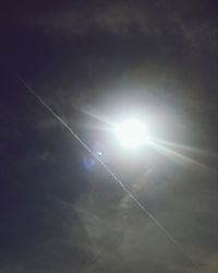 Low angle view of vapor trails in sky