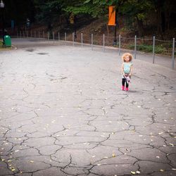 Girl playing with umbrella