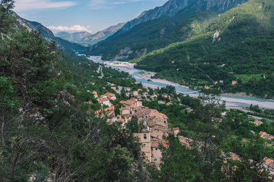 Aerial view of townscape amidst valley