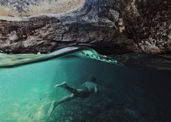 Man swimming in sea