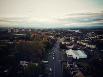 High angle view of buildings in city against sky