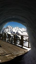 Scenic view of snow covered mountains against sky