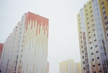 Low angle view of skyscrapers against sky