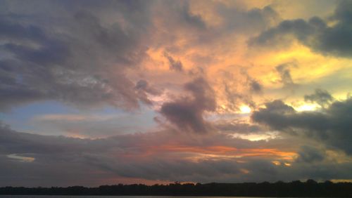 Scenic view of landscape against cloudy sky