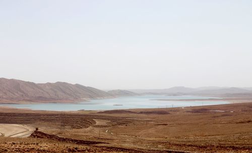 Scenic view of desert against clear sky