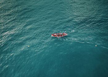 High angle view of red boat in sea