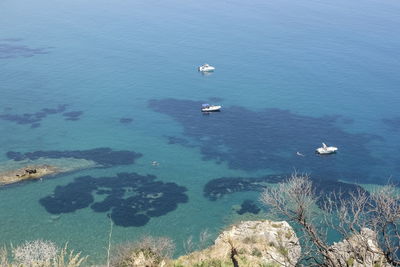 High angle view of boats in sea at capo zafferano