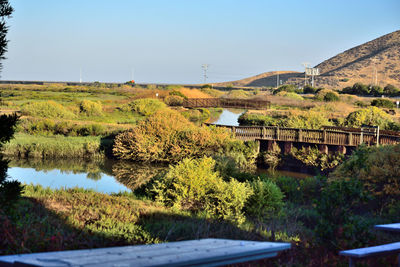 Bridge over river against sky